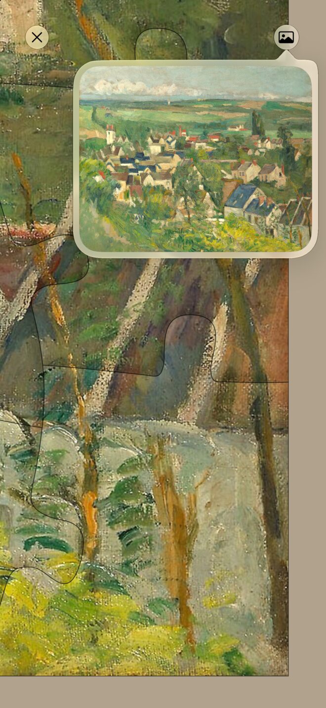A few joined pieces close up, their rims shaded from the same direction so they read as raised off the table, with the finished picture open in a popover above them.